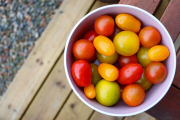 Cherry tomatoes in different colors in a bowl