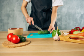 Cook woman lunch at home vegetarian food cutting board