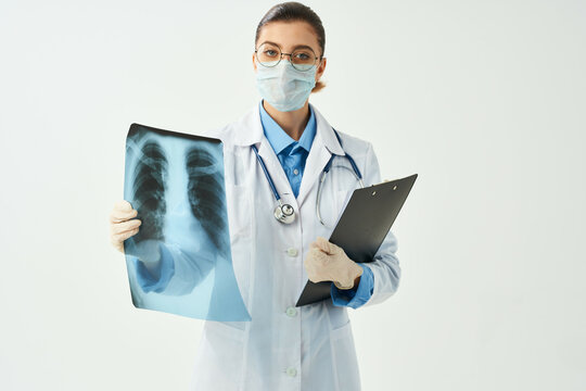 female doctor in white coats medicine hospital x-rays diagnostics