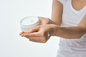 cream in female hands moisturizing dermatology skin care