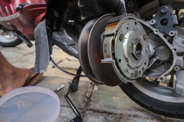 Fototapeta premium Motorcycle CVT transmission gear fixing enngine close up