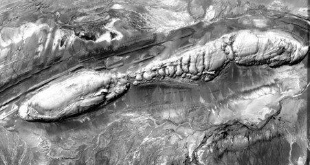 Black and white photo, abstract photography of landscapes of the deserts of Africa from the air,