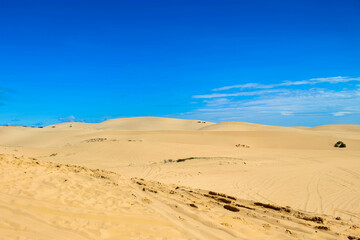 Fototapeta na wymiar Mui Ne's sand dunes and clear sky in Viet Nam