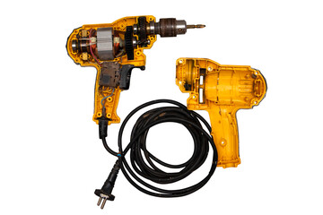 detachable used electric drill on white background The lid opens to reveal the internal components that include the motor, gear and switch.