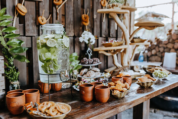 Beautifully decorated snacks on the banquet table before the holiday. Catering food and drink on wedding party