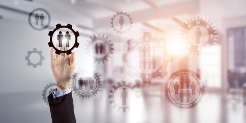 Teamwork concept and choosing gesture of businessperson in elegant modern interior