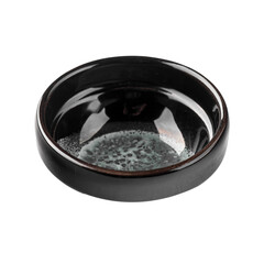 Isolated black asian soy sauce dish on a white background