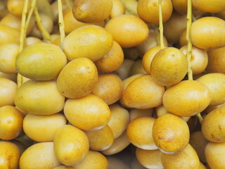 A beautiful bouquet of fresh barhee dates palm background