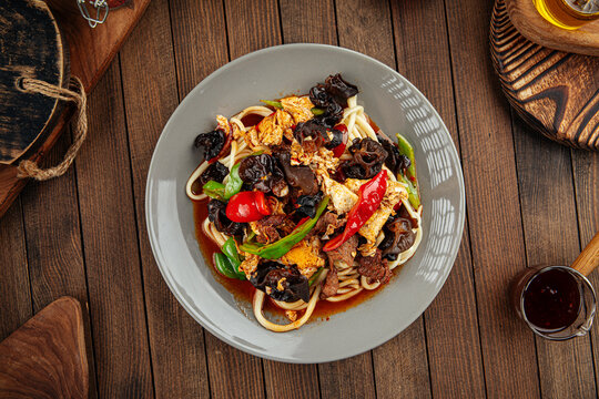Uyghur dish guiru lagman noodles with ear mushrooms