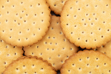 Background of round delicious chip cookies with filling on a white background.
