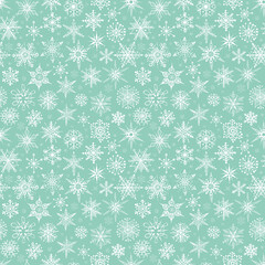 Seamless pattern with hand drawn doodle snowflakes. Can be used for wallpaper, pattern fills, textile, web page background, surface textures.