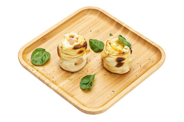 Pizzetti on a wooden plate. Variety of pizza isolated on white background.