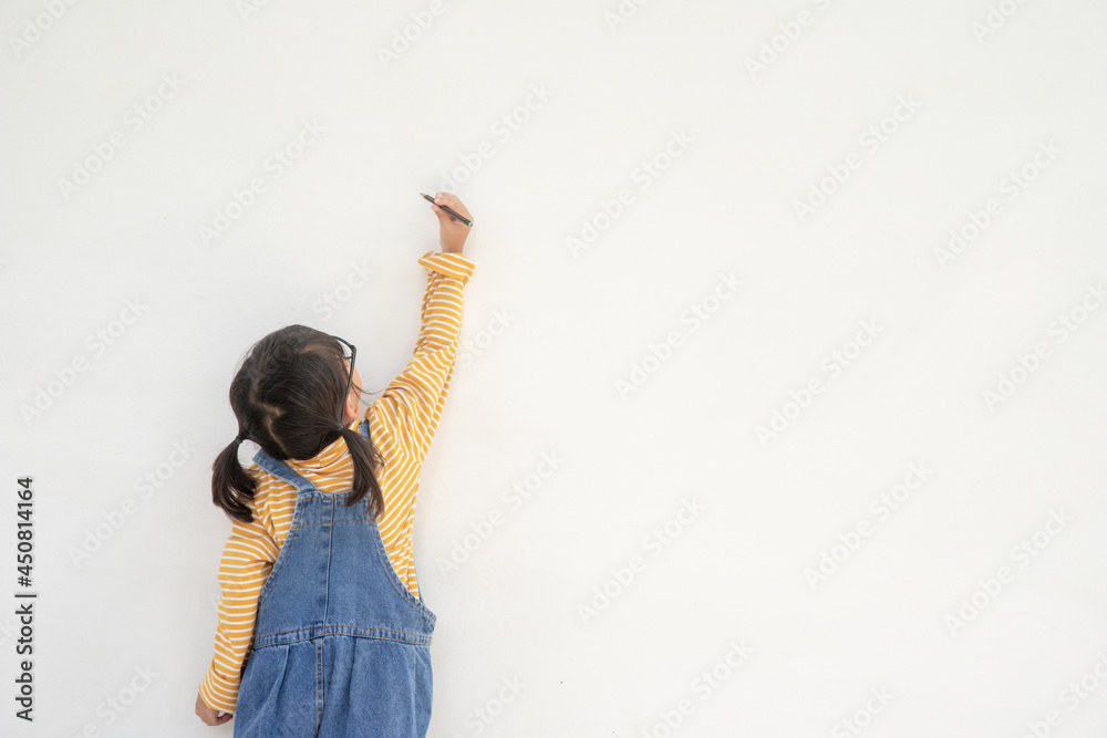 Wall mural Little children painting on white wall