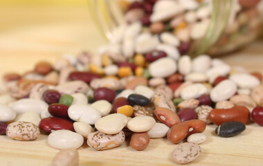 Mix of Dried Beans on Wooden Background