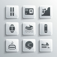 Set Helmet, Snowmobile, Skateboard trick, Jet ski, Ski lift, Rugby ball, and sticks and Landslide icon. Vector