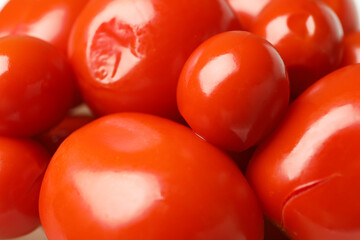Pickled red tomatoes, close up and selective focus