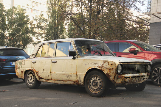 Kiev, Ukraine - October 14, 2019: Soviet rotten VAZ 2101 car in the city