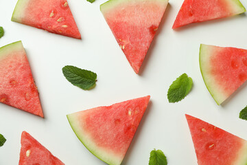 Flat lay with watermelon slices on white background