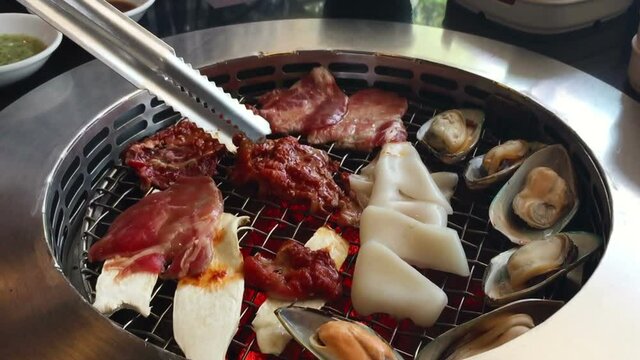 Asian BBQ-Style.  sliced meat and grill hot pan