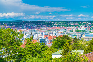 Germany, Aerial panorama view above downtown stuttgart city houses and churches making up the...