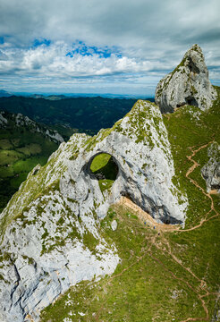 
Aerial view of the spectacular giant porthole of Monte de Pe&ntilde;a Mea, Asturias, Spain