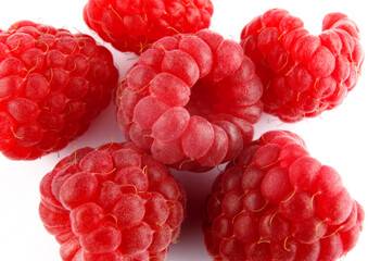 Ripe raspberry on a white background. Raspberry berries.