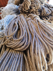 a group of rope hanging at market