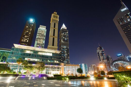 Dubai, UAE – April 18, 2021: night view on skyscrapers Hotel Grand Mercure Majlis, The Tower, Capricon Tower, Maze Tower, Museum of Future, on side Gate Avenue