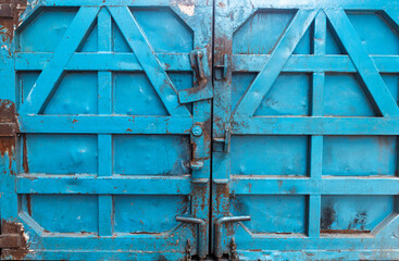 old vintage steel door blue in the old city