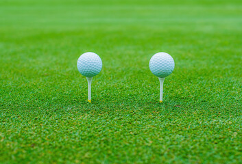 golf balls on green grass
