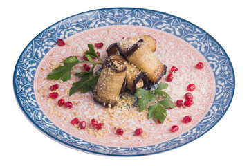 Stuffed eggplant with pomegranate on a plate