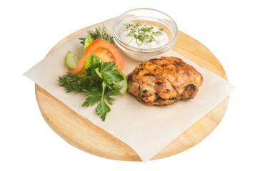 baked meat with vegetables and sauce