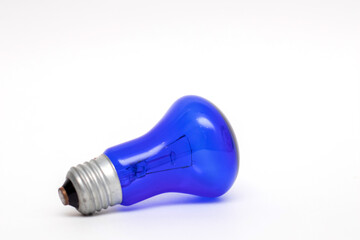Blue light bulb lamp isolated on white background