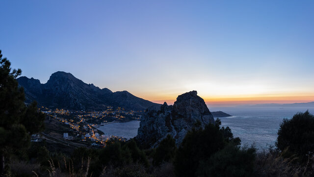Sunset over a coastal town in Morocco seen from Ceuta