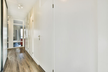 A long empty corridor designed in minimalistic style