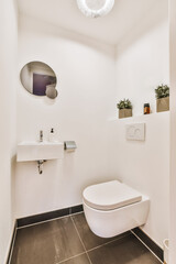 Fototapeta na wymiar Interior of small clean washroom in miniature style