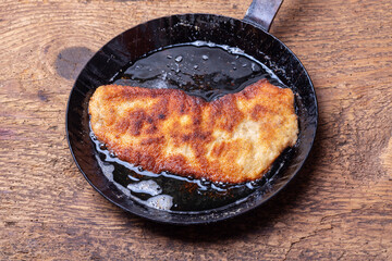 wiener schnitzel in a pan