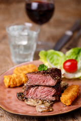 steak slices with croquettes