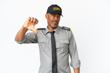 Senior staff man isolated on white background showing thumb down with negative expression