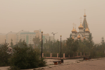 .Siberian city Yakutsk in the smoke from forest fires.