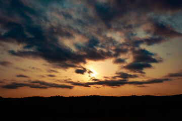 sunset over the clouds