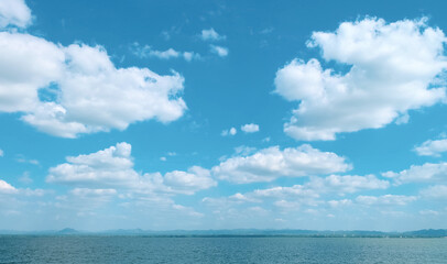 Scenic clouds and blue sky background. The natural beauty of the tropical sea landscape. Horizon...