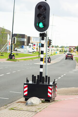 Portable traffic light with green light in the Netherlands