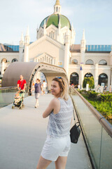Vertica shot of a Caucasian woman in front of 