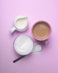 Sweetening coffee with milk with a sweetener