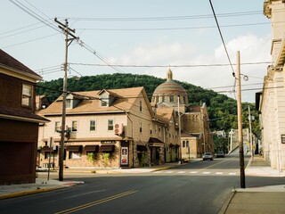 Fototapeta na wymiar 4th Street and the St. Marys Byzantine Catholic Church, in Cambria City Historic District, Johnstown, Pennsylvania