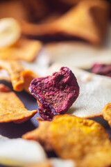 Dried chips from different organic vegetables close-up