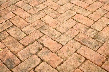Texture orange old blick tile floor of sidewalk for background