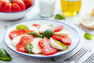 Mozzarella and tomato salad with basil, olive oil and ciabatta bread