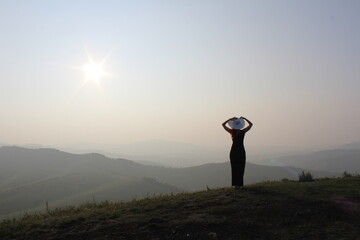 a girl in the mountains